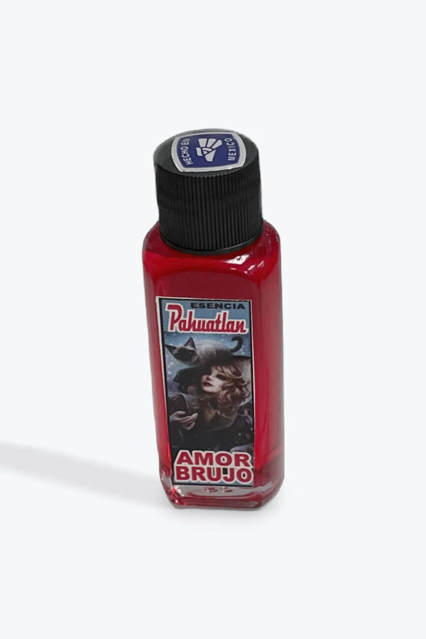 Red bottle of Pahuantlan Amor Brujo essence oil