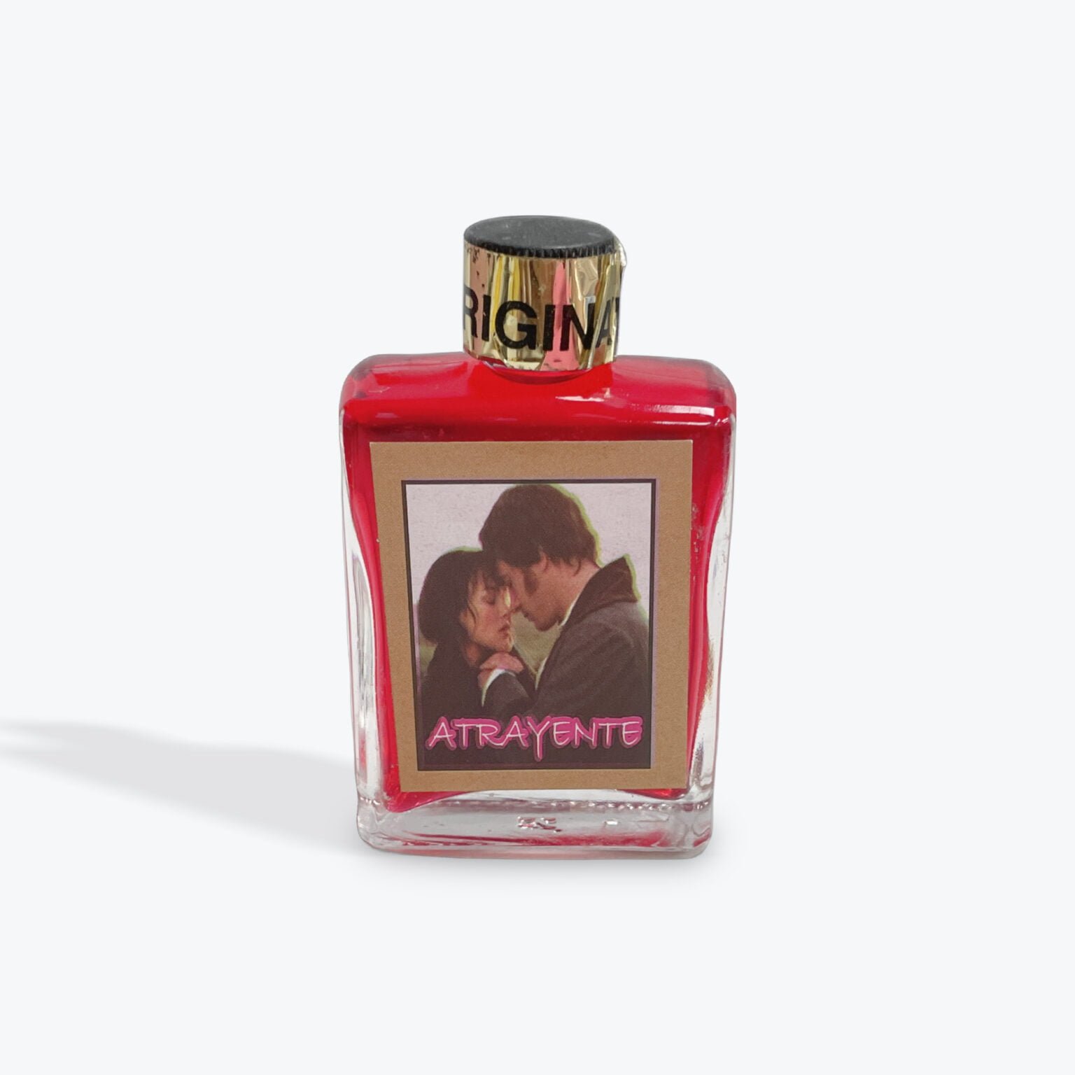 Red bottle of Atrayente love essence with a romantic couple image